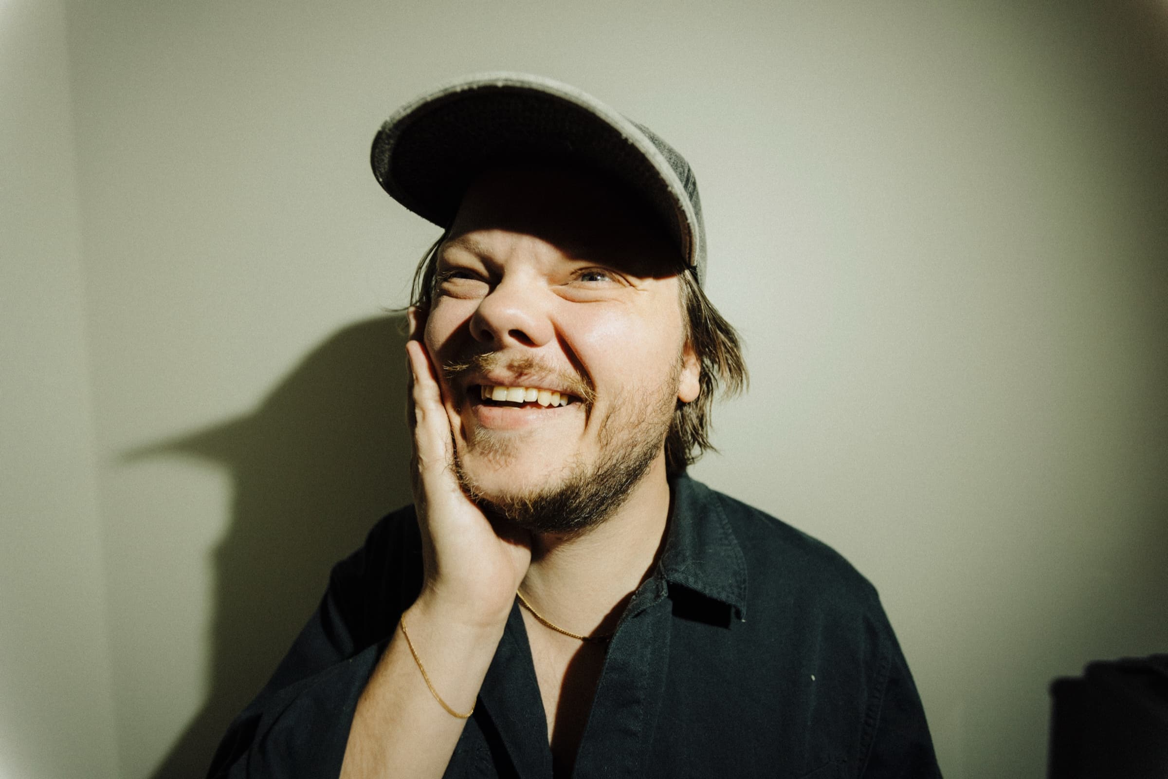 Jarrod Winkler smiling in a candid portrait